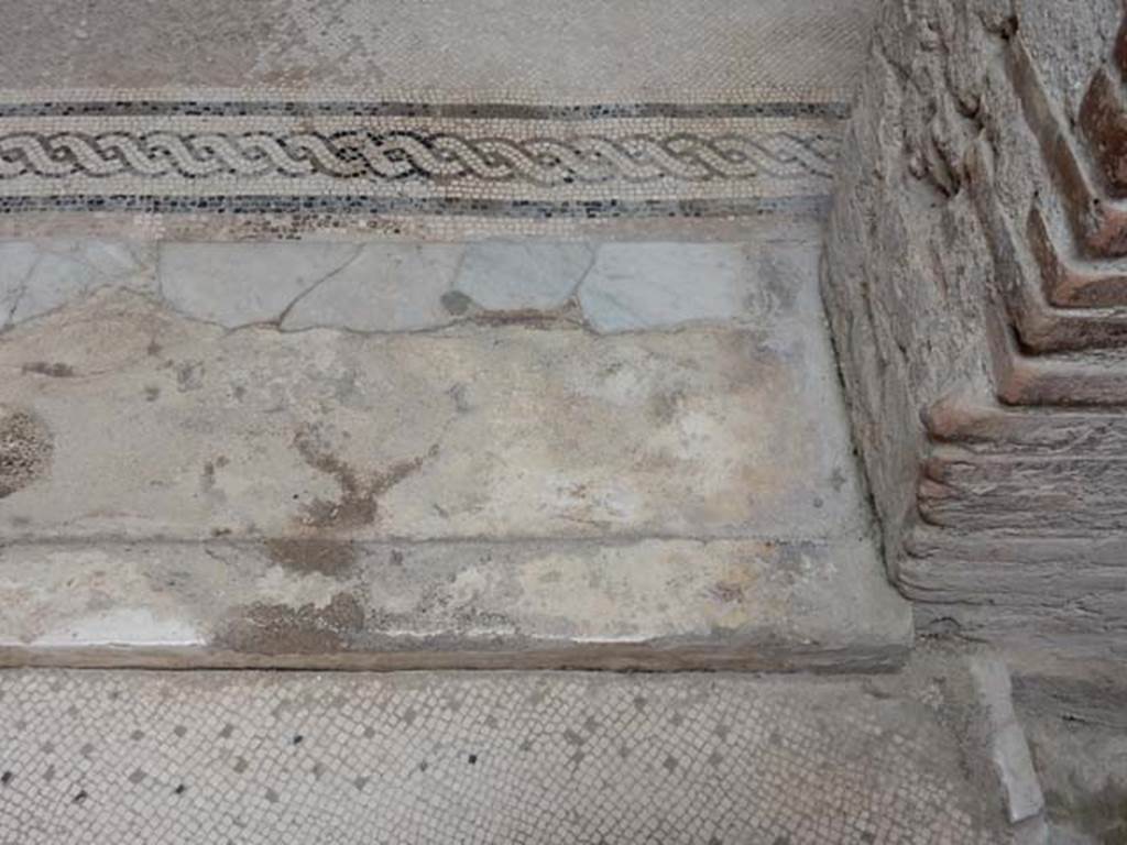 V.8 Herculaneum. May 2018. Room 7, doorway threshold at east end of central doorway.
Photo courtesy of Buzz Ferebee.